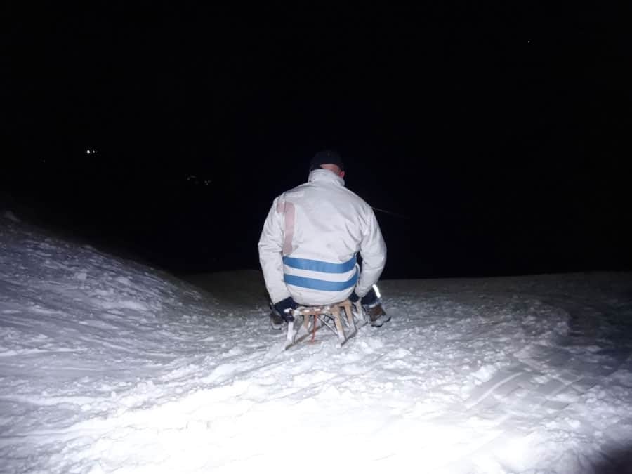 Schlittenfahren bei Vollmond